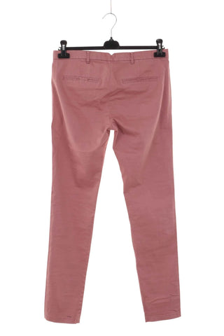 Różowe spodnie materiałowe typu slim fit
