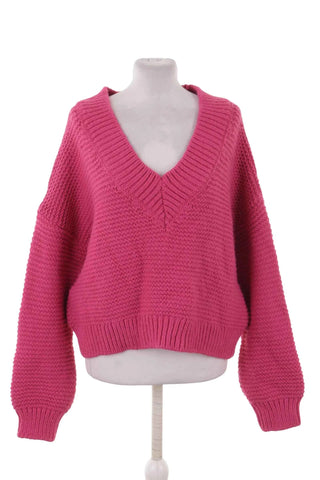 Dzianinowy sweter oversize z dekoltem V - Różowy